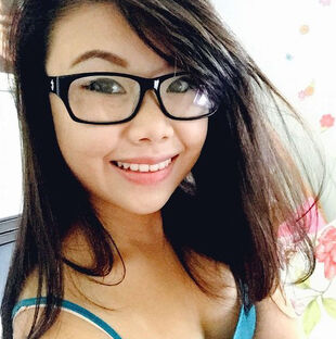 Luxurious asian female in glasses..